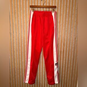 Adidas Red Joggers with white stripes
